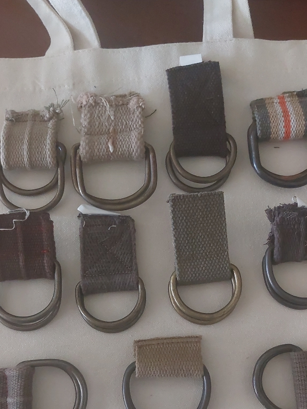 Eleven Larger Pairs of Double Ring Metal Belt Buckles